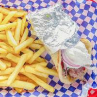 Pork Souvlaki · Marinated cubes of pork tenderloin flame broiled with lettuce, onion, tomatoes, and tzatziki...