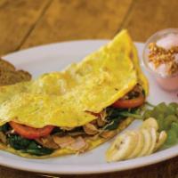 Create Your Own Omelette · Omelette served with American cheese and your choice of three ingredients: spinach, onions, ...