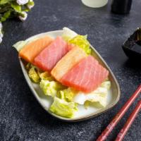 Tuna Touchdown Sashimi · Six pieces of tuna sashimi.