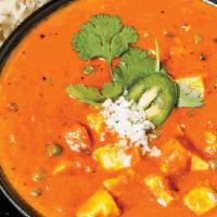 Mattar Paneer (Gf) · Paneer cheese and green peas simmered in an onion curry with a touch tomato sauce and cream....