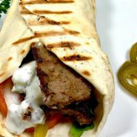 Gyro Sandwich · Beef and Lamb Gyro topped with pickles, onions, tomatoes, fresh lettuce and tzatziki sauce a...