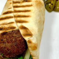 Falafel Sandwich · Freshly fried patties made from ground chickpeas, Mary's signature spices, then warped in fr...