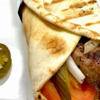 Lamb Kabob Wrap · Freshly Grilled Lamb prepared by our master Chef  then warped in fresh Pita Bread with fresh...