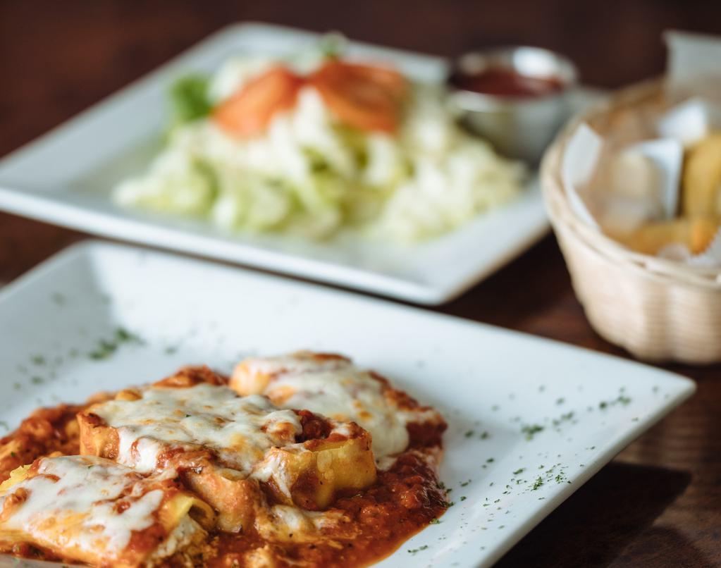 Pasta Trio · A simple of our delicious lasagna, baked manicotti and cannelloni all in one dish.
