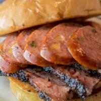 Big Urban Sandwich · Moist cut Brisket and Jalapeno Cheddar sausage link.