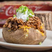 Bbq Meat Potato · Our famous big baked potato topped with your choice of smoked meat.