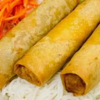 Fried Eggrolls / Bun Cha Gio · Fried eggrolls over vermicelli. Garnish with beansprouts, lettuce, carrots, cucumbers, and g...