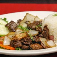 Stir-Fried Shaking Beef / Com Bo Luc Lac · Stir-fried shaking beef cube. Slice cucumbers, tomatoes, pickled carrot, onion and serve wit...