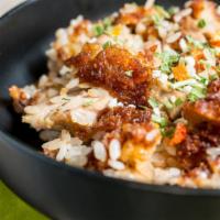Chicken Fried Rice · Rice stir-fried in a wok with fresh chicken.