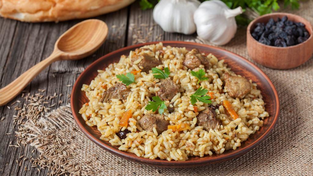 Beef Fried Rice · Rice stir-fried in a wok with savory beef.