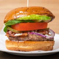 - The Buffalo Blue Burger · Our 100%  (8oz) Texan Angus Beef Patty,  Buffalo Sauce, Smoked Bacon, Aged Dutch Blue Cheese...