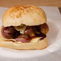 - Sancho Sandwich · Kiolbassa Sausage, grilled onions, Swiss Cheese, BBQ Sauce served in a Ciabatta Roll.