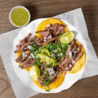 - Arrachera (Fajita) - Street Taco Order ( 4 Mini Tacos ) · Beautiful Inside Skirt (Fajita) sliced and served with onion and  cilantro, limes and salsas.