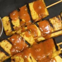 Tofu Satay · (grilled skewered tofu, drizzled w/tamarind-curry, peanut sauce)