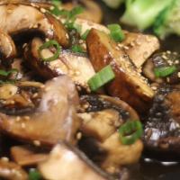 Portobello Teriyaki | Japanese · (portobello and white mushrooms, in sweet, ginger Teriyaki sauce, served w/Jasmine rice)
