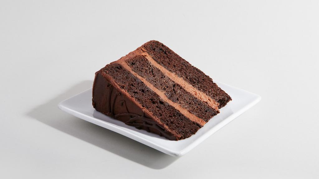 O-M-G! Chocolate Cake (Slice) · Five layers of dark, moist chocolate cake sandwiched with the silkiest smooth chocolate filling and finished with elegant dark chocolate ganache.