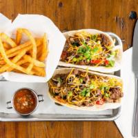 Beef Fajita · Seasoned beef, grilled peppers and onions, cheddar and jack cheese, pico de gallo and salsa....