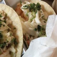 Shrimp · Seasoned shrimp, house-made slaw, cilantro, cotija cheese, chipotle sauce, and lime wedge. S...