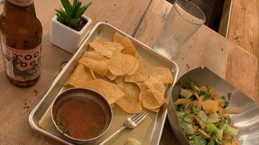Chips & Salsa · House-made crispy corn tortilla chips made fresh daily. Served with our signature salsa.