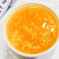 Egg Drop Soup (Large) · Wispy beaten eggs in homemade broth and topped with corn.