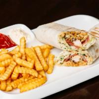 Chicken Shawarma · A thin slice of chicken marinated topped with onion, tomato, pickles and cheese with freshly...