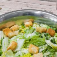 Caesar Salad · Romaine, croutons, parmesan. Includes 2 breadsticks and a dressing. Add toppings for an addi...
