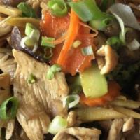 Pad Ginger · A Thai ginger stir fried with white mushroom, shiitake mushrooms, broccoli, carrots and onio...