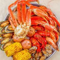 Seafood Platter · Snow crab, whole shrimp, crawfish, mussels, clams, corns, and potatoes. Not sold by the poun...