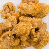 Popcorn Chicken · Juicy and tender halal chicken bites with a salt and pepper seasoning.