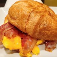 Sunrise Sandwich · English muffin or croissant with eggs, & choice of sausage or bacon.
