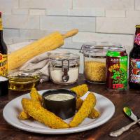 Fried Pickle Spears · Fried dill spears with ranch dressing