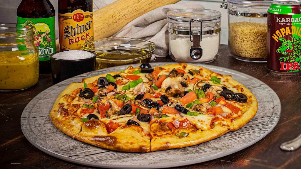 The Veggie · Roasted tomato sauce, mushrooms, onions, peppers tomatoes, and black olives.