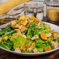Chicken Caesar Salad · Chopped romaine tossed with caesar dressing, grilled chicken, herbed croutons, and shaved pa...