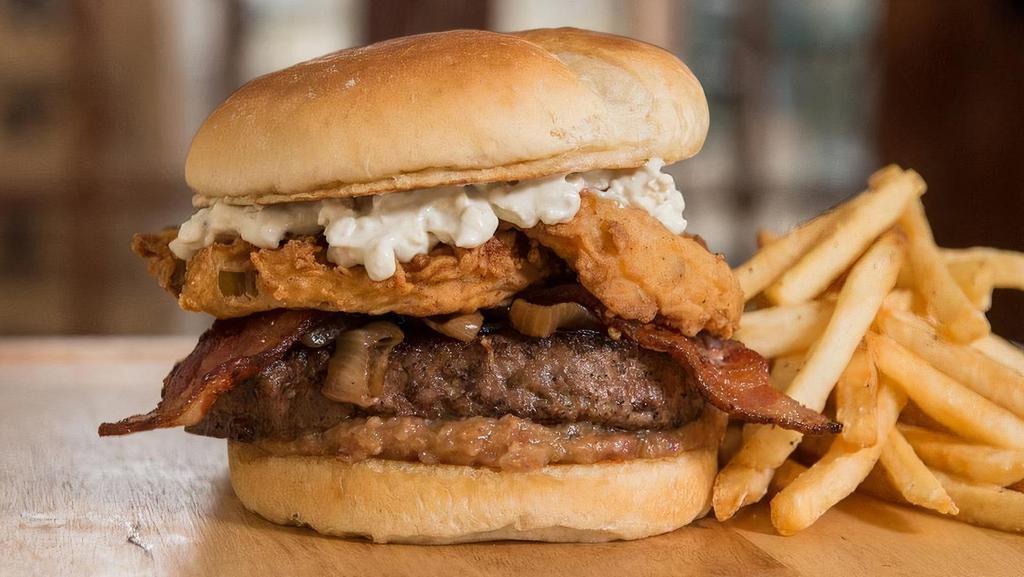 The Fried Apple Blue Cheese Bacon Burger · 1/2 lb with fried Granny Smith apples, blue cheese aioli, Applewood, Smoked Bacon, grilled onions & housemade bacon-onion Jam