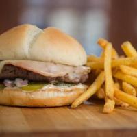 The Piggie Piggie Burger · 1/2 lb burger with canadian bacon, pepper jack, onions, pickles, creole mustard, & housemade...