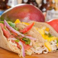 Southwest Fish Tacos · Two marinated & Grilled tilapia filets on corn tortillas, shredded cabbage, house made chipo...