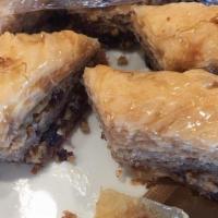 Baklava · Armenian/Greek pastry filled with walnuts and dates smothered in a honey syrup.