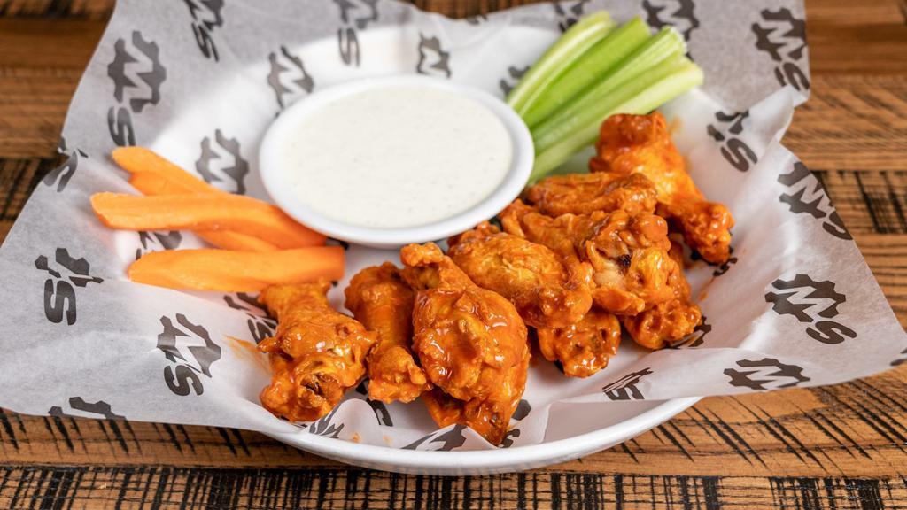 Classic Buffalo Wings · 10 piece wings - celery, carrots and blue cheese or ranch dressing.