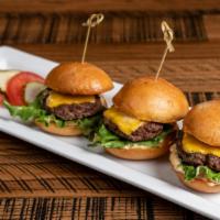 Kobe Beef Sliders · Signature dishes. American cheese, lettuce, tomato, pickle and chipotle mayo.

Consuming raw...