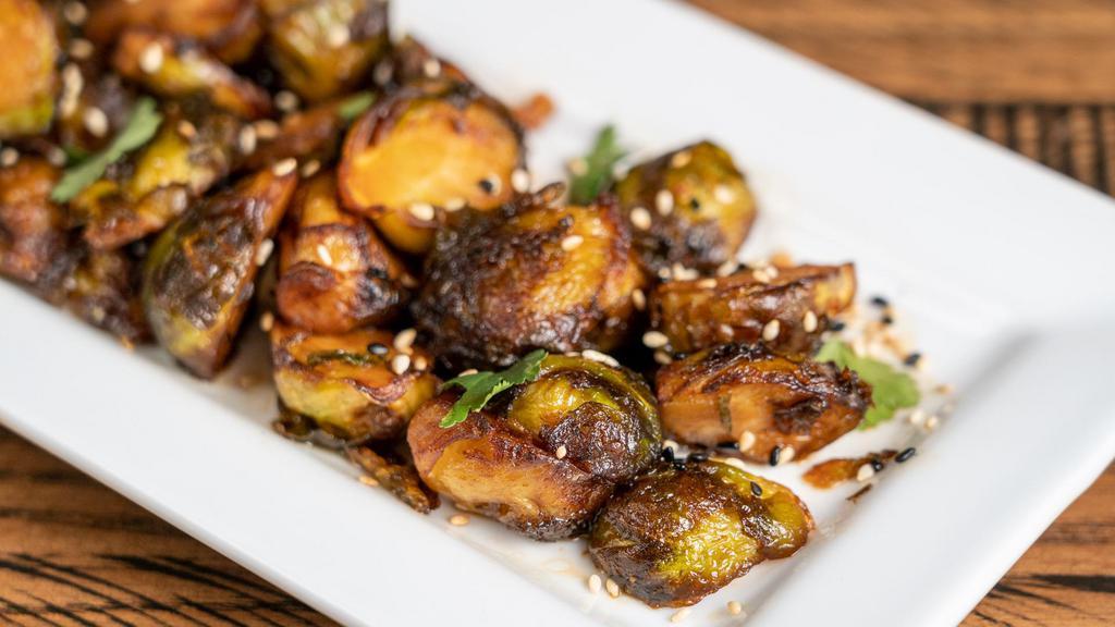 Sweet Chili Brussels Sprouts · Sweet chili garlic sauce, sesame seeds, cilantro.