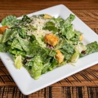 Side Caesar Salad · Romaine lettuce tossed with caesar dressing, Parmesan cheese, Kalamata olives and house-made...