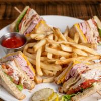 The Club Sandwich · Black forest ham, smoked turkey, Monterey Jack and Cheddar cheese, applewood bacon, lettuce,...
