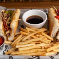 Philadelphia Cheesesteak · Signature dishes. Caramelized onions, grilled red and green bell peppers, cream cheese or Pr...
