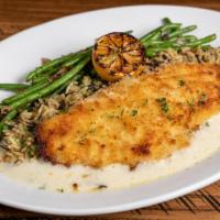 Red Snapper · Parmesan and panko crusted. Lemon butter garlic sauce, bistro rice, sautéed green beans.