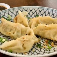 Gyoza · Choice of steamed or fried chicken & vegetable dumpling served with vinegar & sweet soy sauce