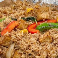 Basil Fried Rice · Fried rice with egg, basil, bell pepper, yellow onion cooked in garlic brown sauce
