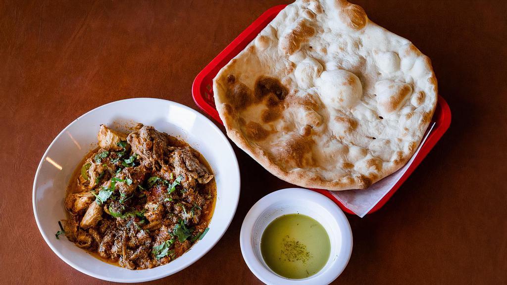 Lamb/Goat Karhai · Lamb/Goat meat seasoned with fresh herbs and spices, cooked to perfection
