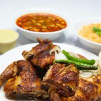Whole Chicken
 · Whole chiken (8pcs),  2  sides of rice and 2 sides of beans, 10 tortillas and 4 salsas.