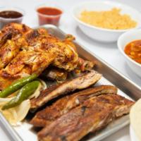 Family Combo
 · Whole Chicken (8 pcs), 3 pork ribs 2 sides of rice 2 sides of beans, 15 corn tortillas and 6...