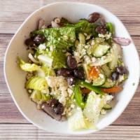 Greek Salad · Freshly chopped romaine lettuce, mixed with onions, tomatoes, bell pepper, cucumbers, kalama...
